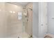 Modern shower with glass door and tiled walls at 2413 Park Ridge St, Apopka, FL 32712