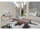 Sophisticated dining room with modern chandelier and a dark wood table with seating for six at 3138 Lee Shore Loop, Orlando, FL 32820