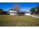 Charming two-story home with landscaped front yard and a two car garage at 36649 Forestdel Dr, Eustis, FL 32736