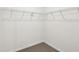 A neutral-walled closet featuring wire shelving and neutral carpeting at 4973 Kaia Ave, Winter Haven, FL 33884