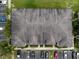 Aerial shot of building roof, parking lot, and landscaping at 5481 Limestone Ln # 5481, Lakeland, FL 33809