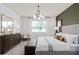 Serene bedroom with a large window, neutral paint, and carpeted floor at 6035 Wildline Dr, St Cloud, FL 34771