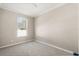 Bedroom with carpet flooring, a window, and neutral colored walls at 780 Old Mount Dora Rd, Eustis, FL 32726