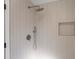 Elegant shower with custom showerhead, rainfall showerhead, and a built-in storage niche at 822 Swaying Palm Dr, Apopka, FL 32712