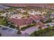 Aerial view of a large community center with pools, parking, and lush landscaping at 9033 Hazard St, Davenport, FL 33896