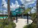 Recreational water park area with water slides and hammocks for relaxation at 9033 Hazard St, Davenport, FL 33896