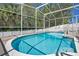 Sparkling screened pool with clear blue water and a pristine, -proof surrounding enclosure at 908 Jade Forest Ave, Orlando, FL 32828