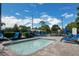 Enjoy a relaxing dip in the pool or unwind on the comfortable lounge chairs under the bright, sunny sky at 908 Jade Forest Ave, Orlando, FL 32828