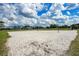 Sandy beach volleyball court perfect for enjoying sunny days and engaging in fun outdoor activities at 908 Jade Forest Ave, Orlando, FL 32828