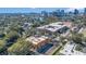 Aerial view of a modern townhome development offering a vibrant urban lifestyle with city skyline in the background at 1004 E Robinson St # 1, Orlando, FL 32801