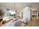 Bright and airy living room with stylish curved sofa, modern decor, and ample natural light for comfortable living at 1004 E Robinson St # 1, Orlando, FL 32801