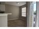 Dining area with window and sliding door access to balcony at 1017 S Hiawassee Rd # 3735, Orlando, FL 32835