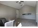 Cozy living room with neutral carpet and walls, featuring a ceiling fan at 1017 S Hiawassee Rd # 3735, Orlando, FL 32835