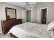 The main bedroom features natural light and a large dresser at 1017 S Hiawassee Rd # 3735, Orlando, FL 32835