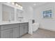 Bathroom with double sinks, soaking tub and a view from the window at 12781 Sw 86Th Circle, Ocala, FL 34473