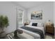 Bedroom featuring a bed, and a window with natural light at 12781 Sw 86Th Circle, Ocala, FL 34473