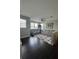 Comfortable living room with tile floors, neutral walls, and stylish furniture including a grey leather sofa set at 1337 Ash Tree Cv, Casselberry, FL 32707