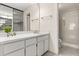 Bright bathroom with a walk-in shower and a single sink vanity at 15 Escondido Ct # 145, Altamonte Springs, FL 32701