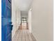Bright entryway featuring tile flooring and a glimpse of the living area at 15 Escondido Ct # 145, Altamonte Springs, FL 32701