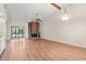 Spacious living room with vaulted ceilings and a fireplace, perfect for entertaining at 15 Escondido Ct # 145, Altamonte Springs, FL 32701