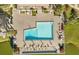 Top-down shot of the community pool with lounge chairs and patio furniture at 15 Escondido Ct # 145, Altamonte Springs, FL 32701