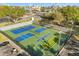 Aerial view of the tennis and shuffleboard courts, a great way to stay active and enjoy the outdoors at 15 Escondido Ct # 145, Altamonte Springs, FL 32701