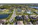 Bird's eye view capturing the community amenities and the layout of the neighborhood, including lakes, pools, and recreation areas at 16003 Tangerine Blossom Way, Winter Garden, FL 34787