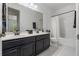 Clean bathroom with double sinks, plenty of countertop space, and a shower-tub combination at 16003 Tangerine Blossom Way, Winter Garden, FL 34787