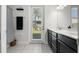 Bright bathroom with double vanity, shower, and private commode at 16003 Tangerine Blossom Way, Winter Garden, FL 34787