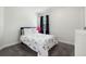 Bright bedroom with carpet, and a window dressed with dark curtains at 16003 Tangerine Blossom Way, Winter Garden, FL 34787