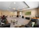 Large carpeted living room offering a tray ceiling, recessed lights and ample space for entertaining at 16003 Tangerine Blossom Way, Winter Garden, FL 34787