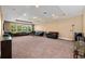 Spacious living room featuring recessed lighting and large windows allowing natural light at 16003 Tangerine Blossom Way, Winter Garden, FL 34787
