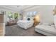 Relaxing main bedroom with lots of natural light, neutral carpet and decor at 16003 Tangerine Blossom Way, Winter Garden, FL 34787
