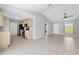 Open-concept kitchen featuring modern appliances and cabinetry adjacent to a bright, spacious living area at 177 Larch Rd, Ocala, FL 34480