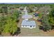 Aerial view highlighting the home's position on a generous lot, with fenced-in backyard at 18 Pine Pass Ln, Ocala, FL 34472