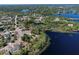 Experience waterfront living with this idyllic home at 209 Roman Ct, Deltona, FL 32738