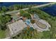 Aerial view of recreation park featuring a skate park, basketball courts and play area at 209 Roman Ct, Deltona, FL 32738