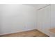 Bedroom featuring wood floors, a closet and lots of light at 209 Roman Ct, Deltona, FL 32738