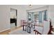 Charming dining area with a view, featuring a cozy table and built-in storage at 209 Roman Ct, Deltona, FL 32738