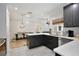 Contemporary kitchen featuring an eat-in bar, stainless steel appliances, and seamless connection to dining area at 209 Roman Ct, Deltona, FL 32738