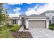 Beautiful single Gathering home with a well-manicured lawn and two car garage at 2296 Sirena Ln, Mount Dora, FL 32757