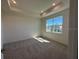 Spacious main bedroom with natural light and a tray ceiling at 2296 Sirena Ln, Mount Dora, FL 32757