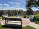 A park area with benches to sit at at 2296 Sirena Ln, Mount Dora, FL 32757