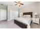 Spacious bedroom featuring neutral walls, carpet, ceiling fan, and natural light at 2361 Baker Ave, Orlando, FL 32833