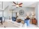 Open-concept living room with soaring ceilings, tile floors, and modern decor at 2361 Baker Ave, Orlando, FL 32833