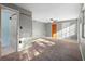 Bedroom with ensuite bathroom featuring a shower and bath combo and a large closet at 241 S Marydell Ave, Deland, FL 32720