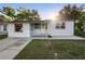 Charming single-story home featuring a well-kept lawn and a classic front entrance at 241 S Marydell Ave, Deland, FL 32720