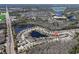 Aerial view of the residential community with water features, convenient access to major roads, shops and the local school at 2519 Cypress Trace Cir, Orlando, FL 32825