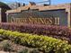 The community sign for Cypress Springs II with well-maintained landscaping at 2519 Cypress Trace Cir, Orlando, FL 32825