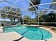 Enclosed pool with seating area and lush foliage at 2519 Cypress Trace Cir, Orlando, FL 32825